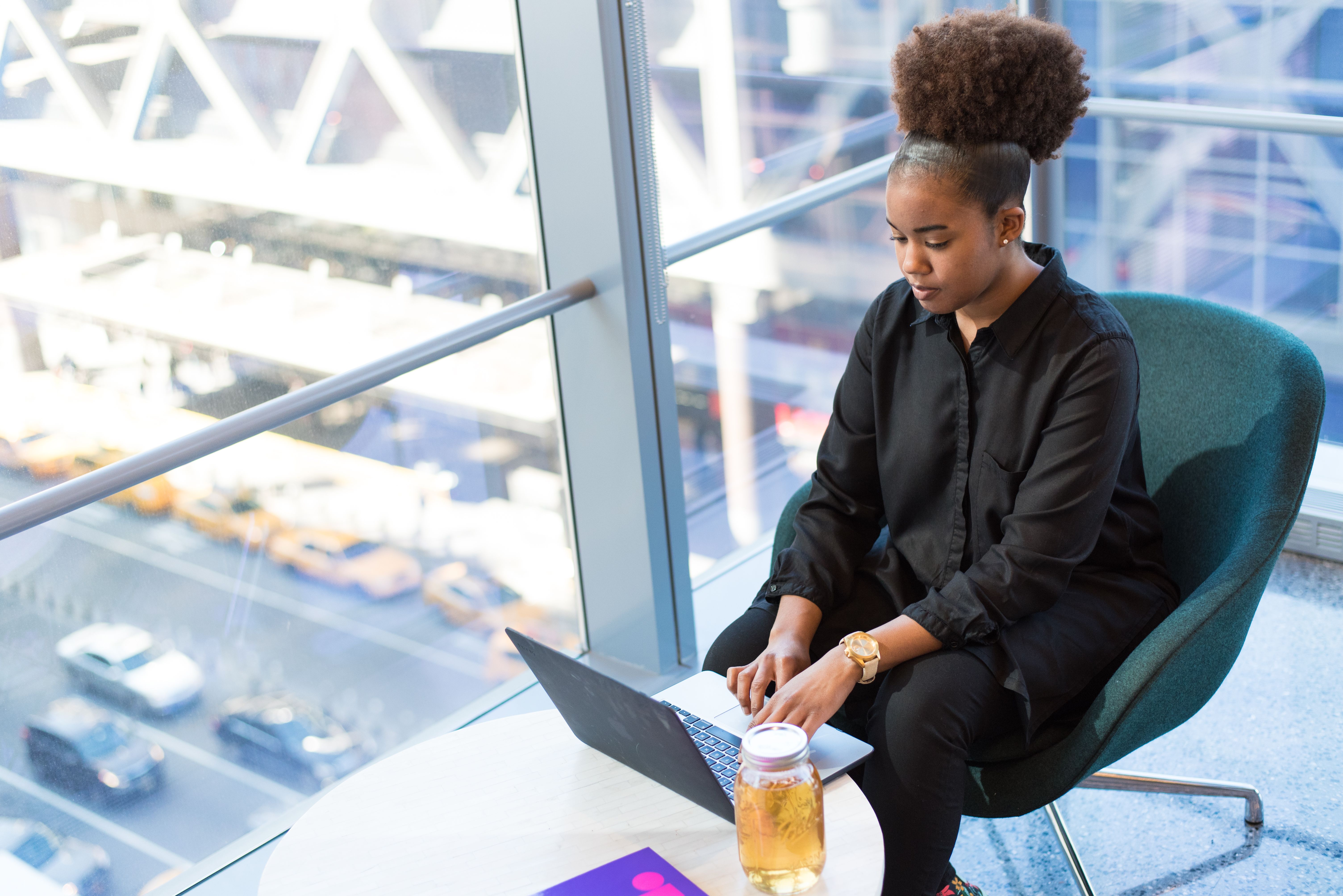 Woman developing technology, data, and artificial intelligence skills through SOFEIOnline