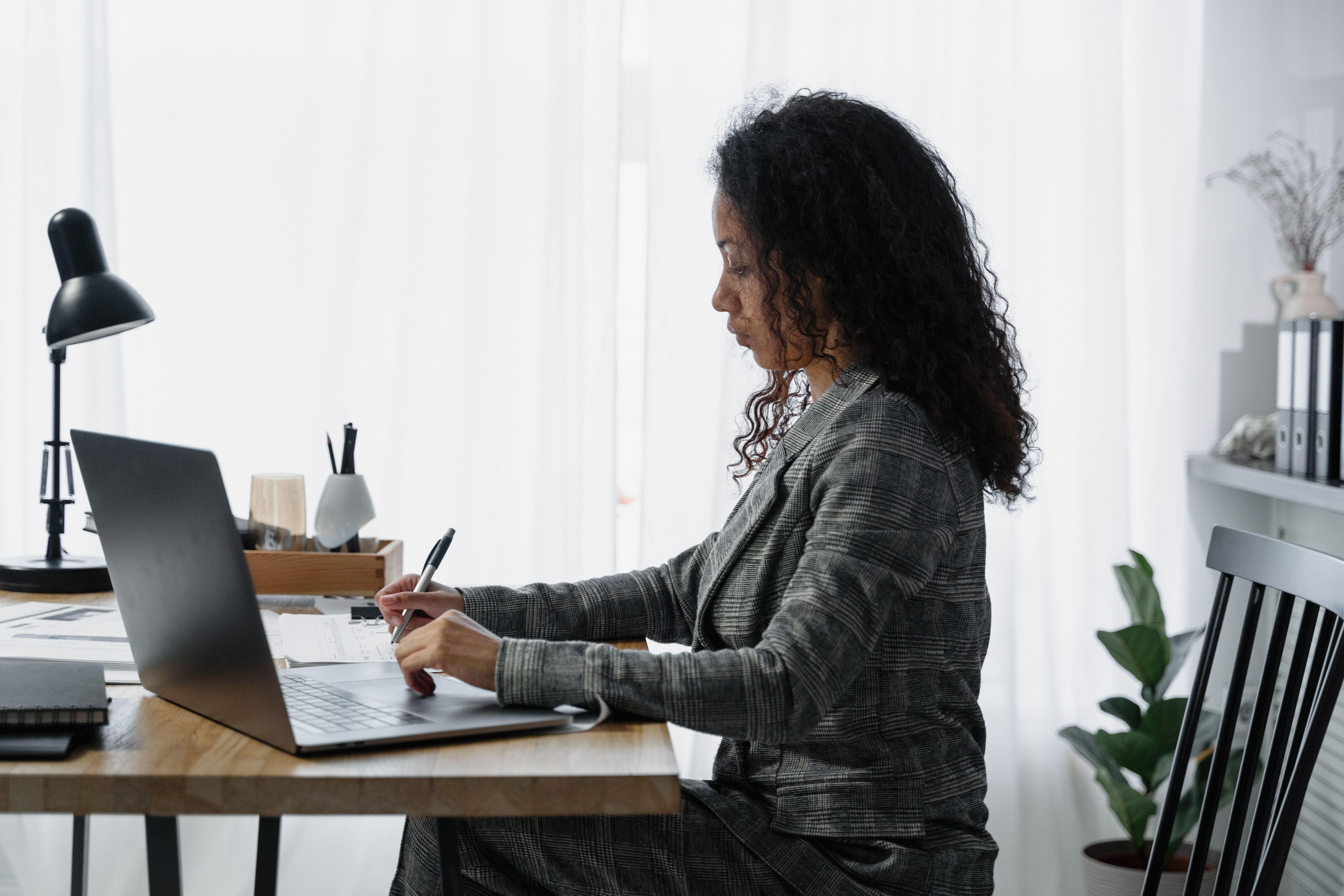 Woman building finance and financial wellness skills through SOFEIOnline